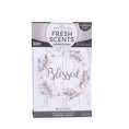 Load image into Gallery viewer, Fresh Scents Blessed Wreath 3pk scented sachets offer a long-lasting air freshener, featuring cream flowers and greenery around "Blessed" on a white wood background.