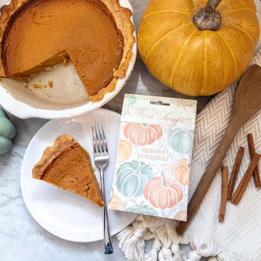 A pack of 'Spiced Pumpkin' scented sachets by Fresh Scents, depicted with plates of pumpkin pie