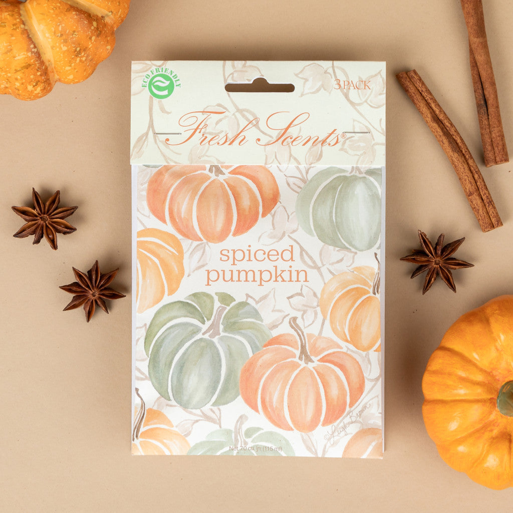 A pack of 'Spiced Pumpkin' scented sachets by Fresh Scents, depicted with autumn-themed decorations including pumpkins and cinnamon sticks.