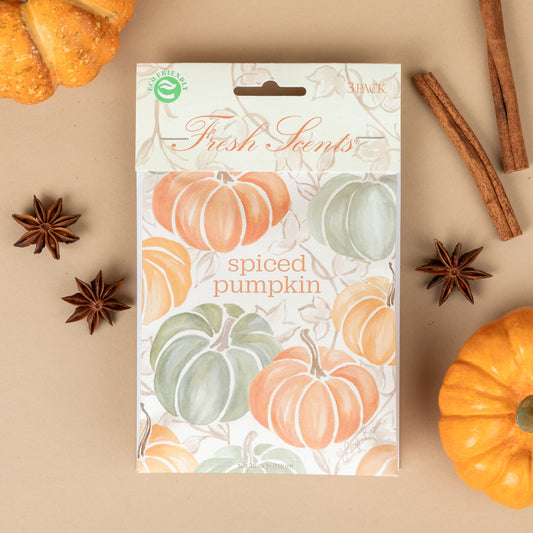 A pack of 'Spiced Pumpkin' scented sachets by Fresh Scents, depicted with autumn-themed decorations including pumpkins and cinnamon sticks.