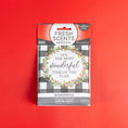 Load image into Gallery viewer, A Fresh Scents Wonderful - Sachet 3pk on a red background shows a wreath and "It's the most wonderful time of the year." This flameless air freshener features a warm, spicy, long-lasting scent.