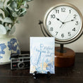 Load image into Gallery viewer, Refuse to Sink Fresh Scents Fragranced Sachet on Table with Vintage Clock and Camera