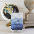 Load image into Gallery viewer, Adventure Mountain Sachet On Counter Top with Black Globe