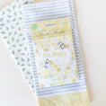 Load image into Gallery viewer, Bee Happy Scented Sachet Flat Lay on Printed Hand Towels
