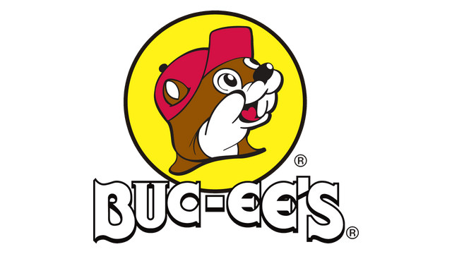 A cartoon beaver wearing a red cap is centered in a yellow circle above the bold, stylized text BUC-EES. The overall logo has a playful and friendly appearance.