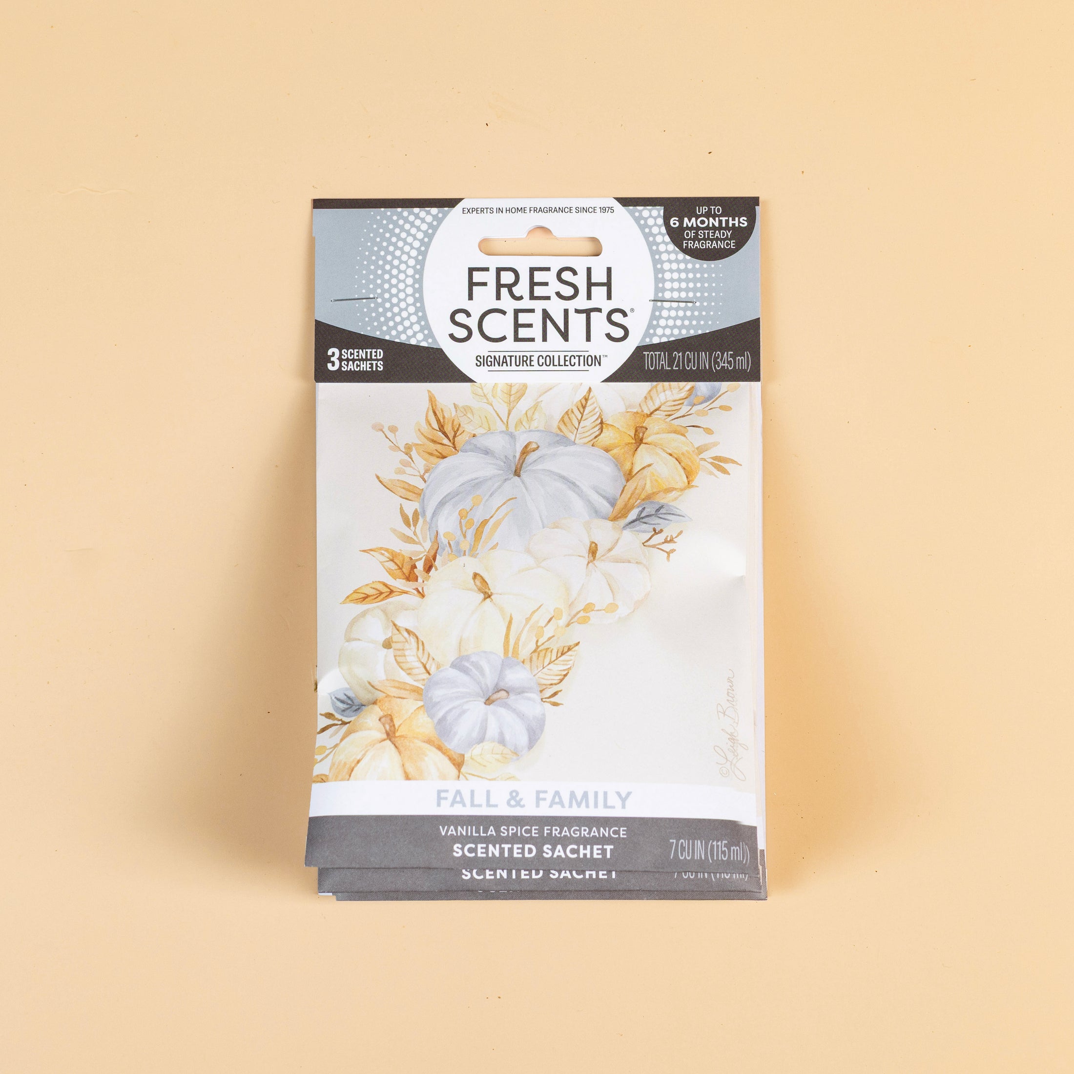 The Fresh Scents Fall & Family - Sachet 3pk fills your home with long-lasting vanilla spice fragrance. Decorated with white pumpkins and autumn leaves on beige, it's an ideal flameless air freshener.