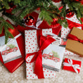 Load image into Gallery viewer, Fresh Scents' Merry Christmas - Sachet 3pk gifts, wrapped in red, white, and brown paper with festive ribbons and red truck tags, are arranged under the Christmas tree for long-lasting holiday freshness.

