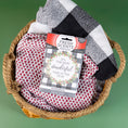 Load image into Gallery viewer, The Fresh Scents Wonderful - Sachet 3pk comes in a woven basket with red and white pattern cloth, black and white checkered cloth, festive scented sachets, and the message "It's the most wonderful time of the year.
