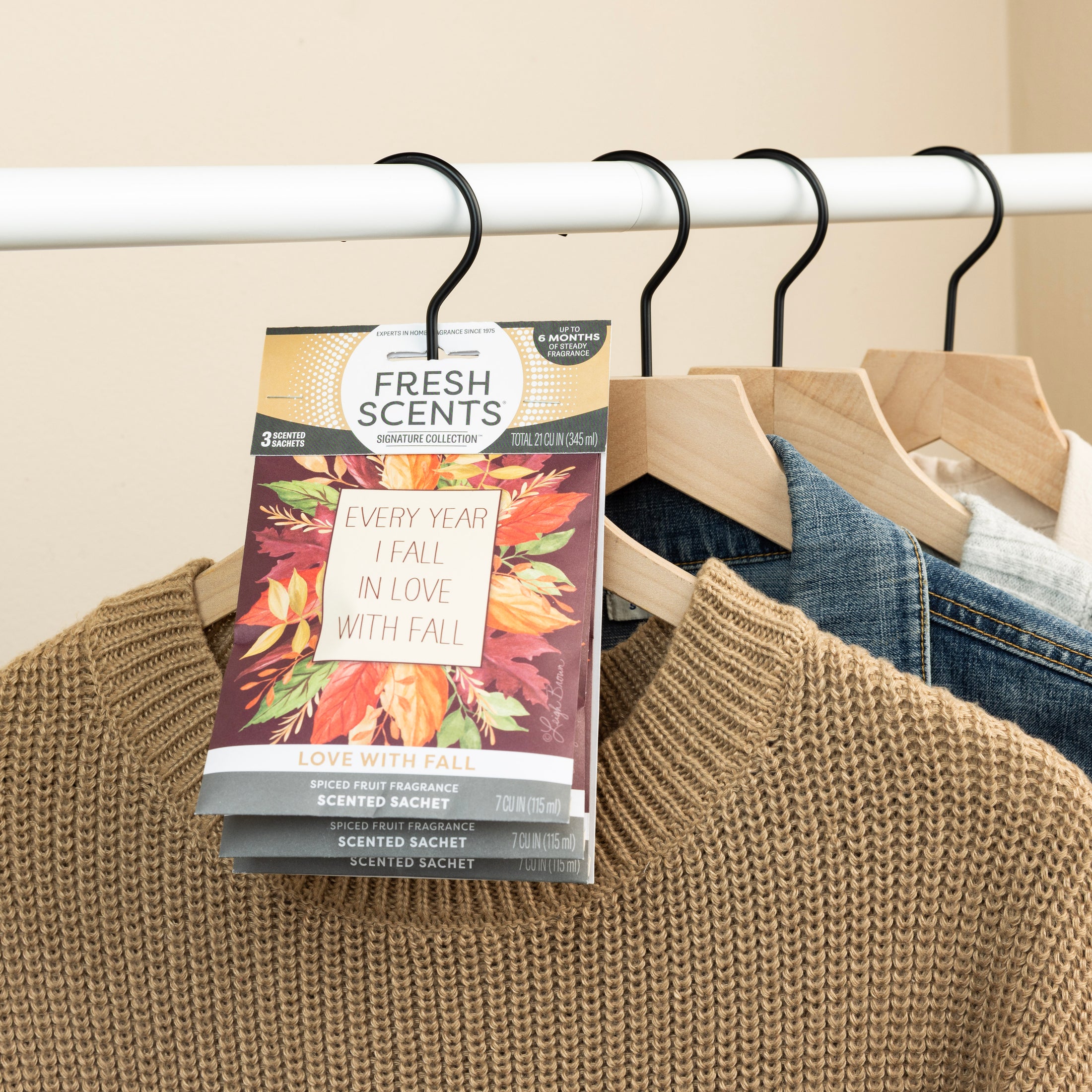 The Fresh Scents Love with Fall - Sachet 3pk fills your closet with an autumn leaves scent and features the text “Every year I fall in love with fall”; perfect for hanging among sweaters and jackets.