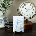 Load image into Gallery viewer, Refuse to Sink Fresh Scents Fragranced Sachet on Table with Vintage Clock and Camera
