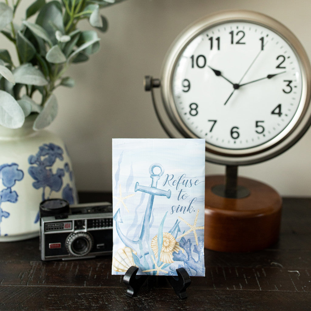 Refuse to Sink Fresh Scents Fragranced Sachet on Table with Vintage Clock and Camera