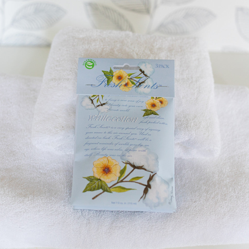 White Cotton Fresh Scents Fragranced Sachet on Stack of Towels