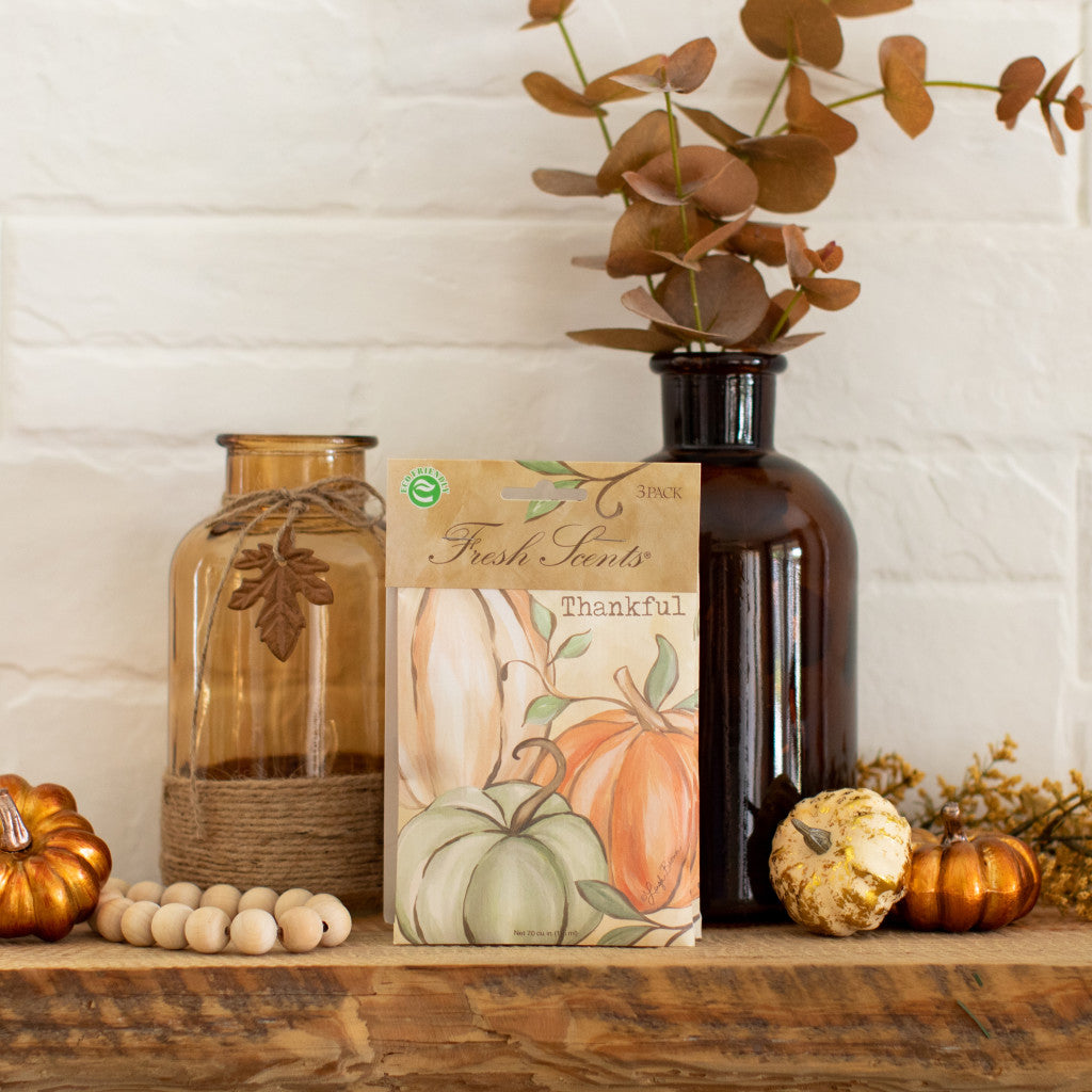 Thankful Fresh Scents scented sachet on mantle with fall decor.
