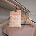 Load image into Gallery viewer, Choose Happy Scented Sachet Hanging on Hanger in Closet
