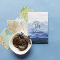 Load image into Gallery viewer, Adventure Mountain Sachet Flatlay on Blue Background with Maps and Compass
