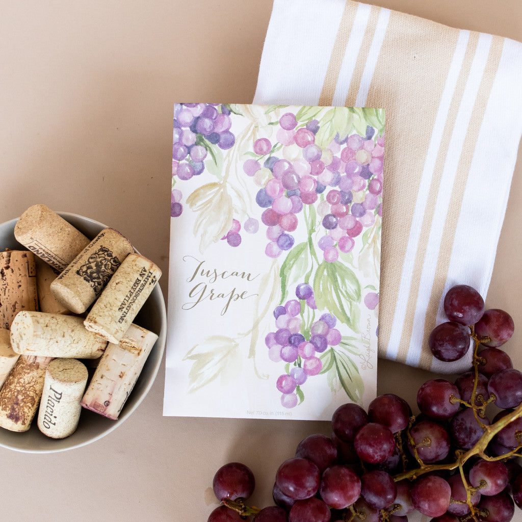 Tuscan Grape Fresh Scents Fragranced Sachet on Towel Flat Lay with Cork and Grapes