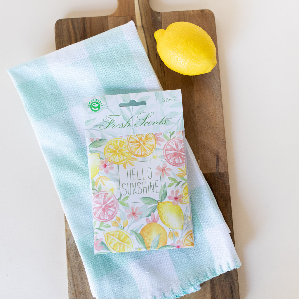 Hello Sunshine Scented Sachet on Cutting Board with Towel and Lemon