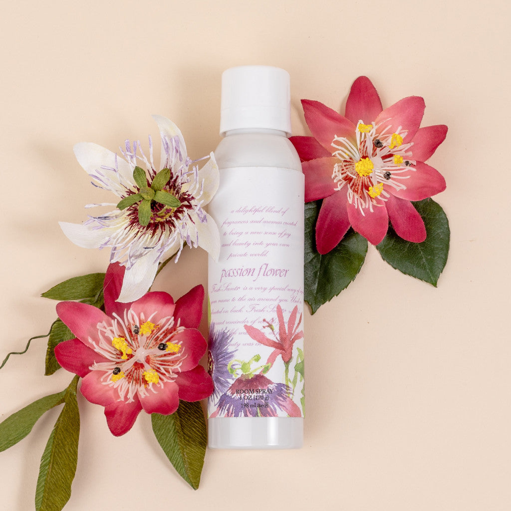 Passion Flower Scented Fresh Scents Room Spray with Passion Flowers on Tan Background